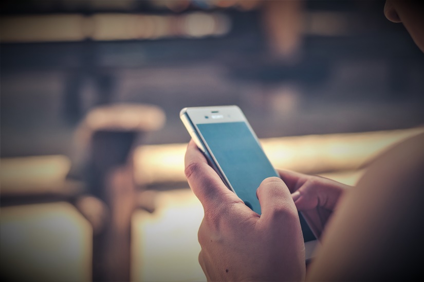 stockvault-using-mobile-phone223812-2